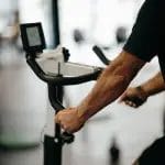 Man riding stationary bike